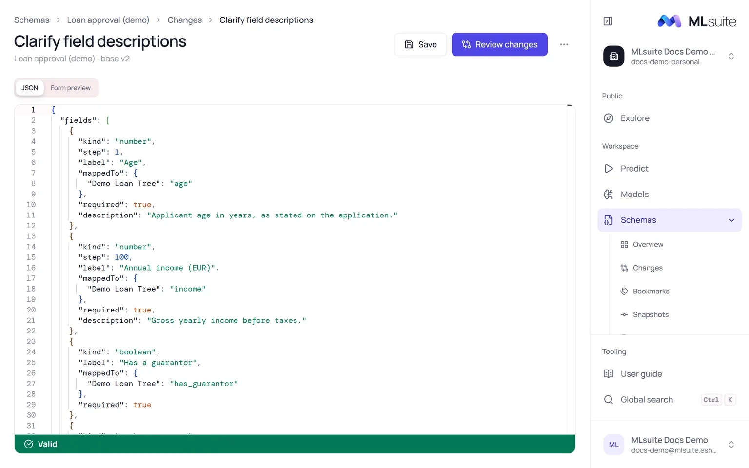 The change editor showing the schema JSON with field descriptions added and a green Valid bar.