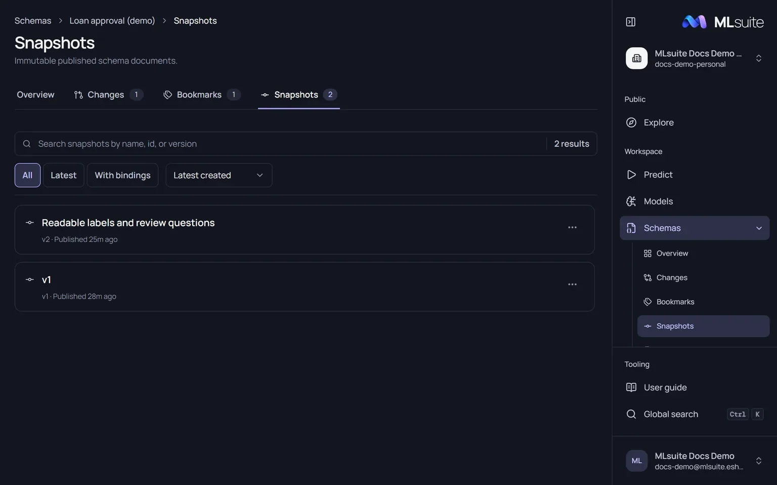 The Snapshots tab listing v2, Readable labels and review questions, and v1.